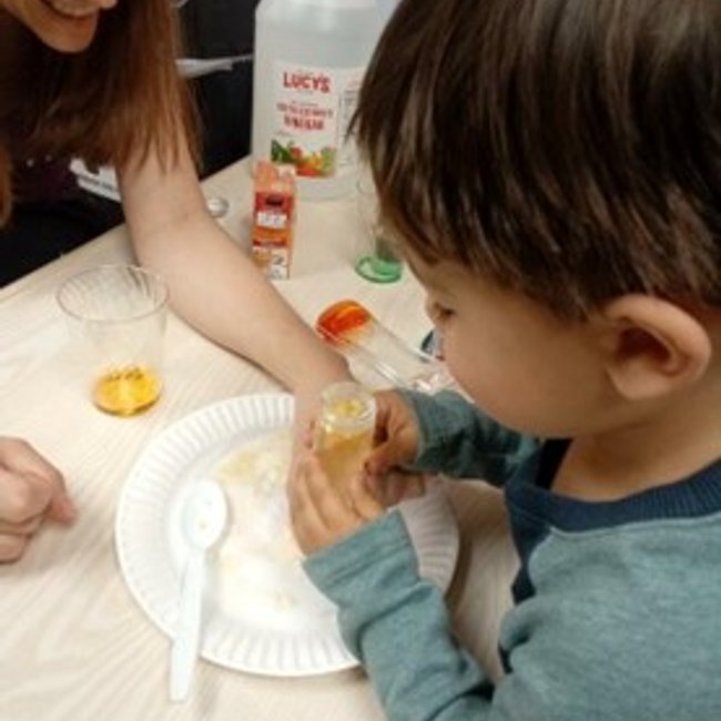 Child engaged in an activity at a daycare near Glenbrook CT.
