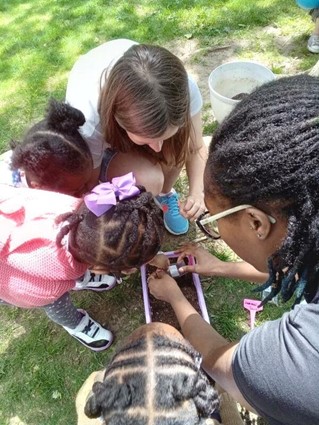 Children and teachers gardening activity at a daycare near Norwalk, CT.