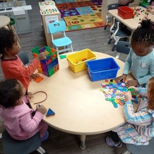 Children playing with building blocks at a daycare near Darien CT